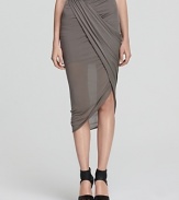 This ultra-soft Helmut Lang skirt wraps and drapes across your silhouette for a unique and truly modern look this season. Lending fashion authority to your days and nights, this piece is one you simply have to own.