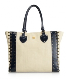 An ultra-chic tote with high-shine detailing is a modern girl must-have for the season ahead. Goldtone studs and whip stitch detailing decorate this soft straw tote by R&Em.