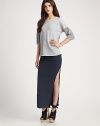 Long, on-trend silhouette with strategically placed ruching and sultry side slits. Elastic waistbandSide ruchingSide slitsAbout 37 long93% cotton/7% polyesterMachine washMade in USA of imported fabric