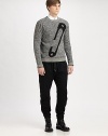 A classic crewneck sweater with an iconic McQ Alexander McQueen design.CrewneckLong sleevesContrast trimVirgin woolDry cleanImported