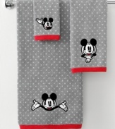 See you real soon! The ever-lovable Mickey Mouse steals the show in this washcloth from Disney, featuring a jacquard woven polka dot backdrop with an embroidered Mickey face. Finished with red trim.