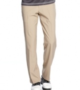 Stay motivated and comfortable enough to walk the course in these stylish flat-front golf pants from Champions Tour, featuring moisture wicking and UPF 15.