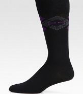 Lightweight and luxurious solid dress socks with logo detail, finished in a comfortable cotton-blend.Mid-calf height34% polyamide/34% cotton/30% modal/2% elastaneMachine washImported