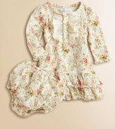 The cozy comfort of a thermal combines with the vintage charm of soft florals and delicate ruffles on this pretty waffle-knit cotton dress.Ribbed crewneckLong puffed sleeves with ruffled cuffsButton-frontRuffled hemCottonMachine washImported Please note: Number of buttons may vary depending on size ordered. 