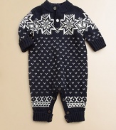 An adorable long-sleeved coverall is intarsia-knit with a festive snowflake pattern, perfect for the holiday season.Ribbed stand collarLong sleevesButton-frontBottom buttonsCottonMachine washImported Please note: Number of buttons/snaps may vary depending on size ordered. 