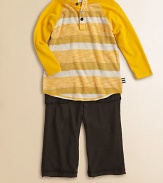 A cheery two-piece ensemble for your little guy, featuring a striped baseball-inspired shirt paired with soft pants. Ribbed crewneckLong sleevesButton frontContrast stitching at hemElastic waistbandFront pocketsBody: polyester/rayonTrim: modal/cottonMachine washImported