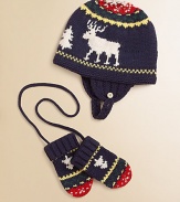 A vintage-inspired reindeer design imbues a cozy hat-and-mitten set with classic seasonal style.Hat fastens beneath the chin with adjustable button strapPull-on mittens without thumbs and connecting stringCottonMachine washImported