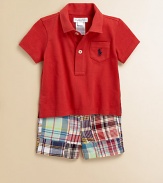 Sure to be a go-to essential, this timeless set pairs a classic cotton jersey polo with a preppy patchwork short and grosgrain belt. Shirt Pointed collarShort sleevesButton-frontEven vented hem Shorts Button closureRear elasticized waistband with belt loopsSewn flySide slant pocketsButtoned back welt pocketCottonMachine washImported Please note: Number of buttons may vary depending on size ordered. 
