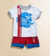 A muddled dirt bike racing print and contrasting stripes make this plush cotton knit a must-have for your little biker.CrewneckShort sleevesShoulder snapsCottonMachine washImported Please note: Number of snaps may vary depending on size ordered. 