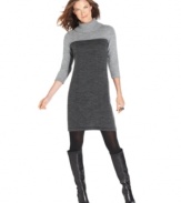 Look cozy and cute in Elementz's petite sweater featuring a sweet tunic length and stylish colorblocking!