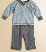 An adorable thermal set for baby with matching cozy pants. Crewneck with V-insetLong sleevesPullover styleElastic waistbandPolyester/cottonMachine washImported