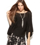 INC's elegant petite pointelle-knit sweater creates a dramatic look with just a hint of skin and flowing kimono sleeves!