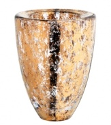 As good as gold, the Glimmer vase radiates holiday fun but dazzles all year long in heavy, shimmering crystal. By Anna Ehrner for Kosta Boda.
