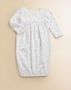 An adorable long-sleeved gown is rendered in soft, cotton jersey with a sweet duck print.Cross-wrap necklineLong sleevesPullover styleGathered empire waistElastic bottom bandCottonMachine washImported