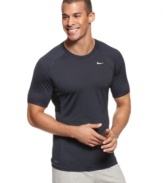 Ready to run? Gear up to go with this fitted Nike t-shirt with Dri-Fit technology for increased dryness and comfort.