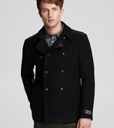 Skull detail on the buttons and leather trim give this peacoat a bit of edge, but the fine blend of materials is rounded out with cashmere for a softer finish.