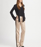 Shimmering jacquard pants invigorated by contrasting side panels and voluminous wide-leg construction. Button closureZip flyBack besom pocketsRise, about 8½Inseam, about 3745% silk/30% metallic fibers/25% cottonDry cleanMade in USA of imported fabricModel shown is 5'7 (174cm) wearing US size 2.