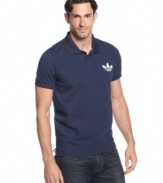 Stay versatile. Sporty can go anywhere when you're in this polo shirt from adidas.