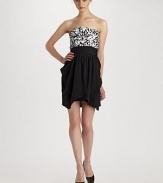 Light catching sequins in contrasting shades, adorn the front bodice of this high-impact draped silk number.Strapless neckline Sequined bodice Ruched waistband Draped silk skirt Back zipper Contrast inserts at back bodice Fully lined About 29 from shoulder to hem Silk Combo fabric: 90% nylon/10% polyester Dry clean Imported