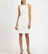 Textual, luxe brocade, tailored with crisp pleated details and embellished with jeweled beading.Jewel neckline with beaded detailSleevelessFront pleatsBeaded waistbandBack ventConcealed back zipFully linedAbout 23 from natural waist69% acetate/12% polyester/12% cotton/7% metallic threadDry cleanImportedModel shown is 5'10½ (179cm) wearing US size 4. 