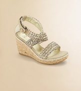 Straps of richly woven raffia with a glowing metallic finish on an of-the-moment rope-covered wedge.Woven raffia upperCrisscross buckle ankle strapRope-covered composite rubber wedge heel and soleMetallic faux leather liningImported