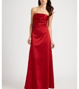 Long and elegant, this strapless design is softened with side ruching. Back zipper with hook and eye closure Fully lined About 43½ from natural waist Perfect for bridesmaids Polyester; dry clean Made in USAOUR FIT MODEL RECOMMENDS ordering true size.. 