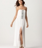 BCBGMAXAZRIA elevates the bohemian silhouette of this silk dress with the addition of a sparkling jeweled front placket and a sexy thigh-high slit at the front of the skirt.