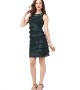 This chic cocktail dress from SL Fashions is sure to make a statement with a slinky shape and fluttering pleats!