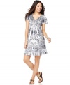 Style&co.'s dress is as pretty as a spring day, with kicky print and a fluid, feminine silhouette! (Clearance)