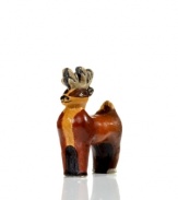 Feel the pull of this charming reindeer, crafted with the distinct personality of all Vaillancourt figurines. Cast in a vintage candy mold, the majestic creature stands alone with beautiful hand-painted detail.