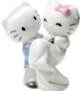 Kitten no more, Hello Kitty is the blushing bride in this adorable collectible. Handcrafted in Lladro porcelain with intricate glazed detail, the too-cute cats make a fun cake topper, too!