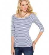 A striped boatneck petite top in a stretchy fabric blend is a flattering classic, from Calvin Klein Jeans. Pair it with jeans or black pants for nautical-inspired style!