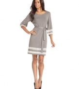 A crochet-inspired lace inset at the cuffs and hem of NY Collection's dress is a radiant touch to this soft sweater dress.