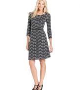 Wavy, trimmed tiers make this ECI dress eye-catchingly stylish!