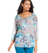 Charter Club's semi-sheer petite top features a floral print for a feminine touch. Pair it with colored jeans for on-trend style.