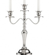 It's all about ambiance. Handcrafted in polished nickel plate, the Hampton candelabra from Leeber brings good old-fashioned grandeur to light.