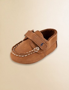 Classic leather boat shoe sets a fashionable course for the little one. Grip tape strap Topstitched trim Crazy horse leather; spot clean Imported