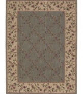 Choose floral and your floor will be sprouting with life. This elegant rug features a gentle palette with a latticework of blossoming vines allover. Bearing the rich patina of premium-quality Opulon(tm) yarns, each rug boasts a densely woven and strikingly luxurious pile that's a pleasure to touch and admire. One-year warranty.