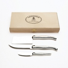 Classic trio of cheese servers includes 4.5 fork-tipped knife, 4 cleaver and 2.75 spreader. Stainless steel handles and blades. Wooden gift box.
