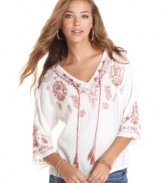 American Rag presents the ultimate in comfy-ccol with a caftan-style top adorned in swirling embroidery! Pair the piece with your fave skinny jeans for a casual weekend look that makes a global statement.