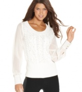 Adorned with cute studs, this cable-knit sweater from XOXO will keep you warm and fashion-forward at the same time!