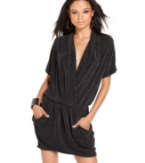 Is it hot in here or is it just this dress!? Baby Phat brings you a spicy short-sleeve dress with dramatic draping with shimmery metallic fabric.