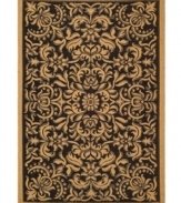 Bold floral designs pop against a black background, creating a lush look underfoot in any indoor or outdoor space. This area rug from Safavieh is made from soft-but-tough polypropylene for superior outdoor durability and easy cleaning.