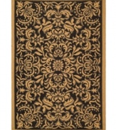 Bold floral designs pop against a black background, creating a lush look underfoot in any indoor or outdoor space. This area rug from Safavieh is made from soft-but-tough polypropylene for superior outdoor durability and easy cleaning.