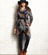 Layer-up this season in a blanket coat from American Rag that's tribal-du-jour. Features a statement-making navajo-print and an organic design of folds and divides.