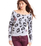 Kicking back never looked so good! Sugar Rush's comfy sweatshirt features a cool leopard print, exaggerated boat neck design and all of the sass you can handle.