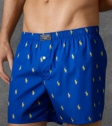 A relaxed-fitting boxer is tailored from crisp woven cotton with an allover pony print for an iconic look from Polo Ralph Lauren.