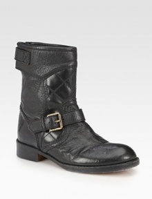 Quilted details and metal buckle straps transform this soft leather essential into an urban must-have. Stacked heel, 1¼ (30mm)Shaft, 8Leg circumference, 12Leather upperAdjustable buckle straps and exposed back zipLeather lining and solePadded insoleImported
