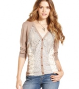 A cute partner to your jeans and tanks, American Rag's cardigan features lace and crochet-knit insets for a bit of artisanal style!