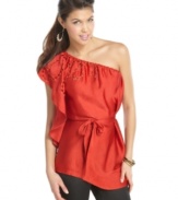 Bring chic, fiesta style to any occasion with this one-shoulder top from XOXO designed with eyelet cutouts!